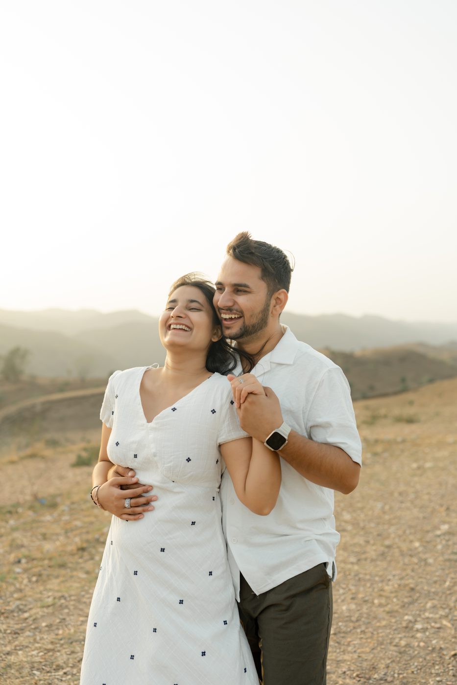 Couple on the hills at dusk